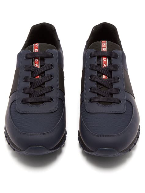 prada trainers blue|navy blue Prada sneakers.